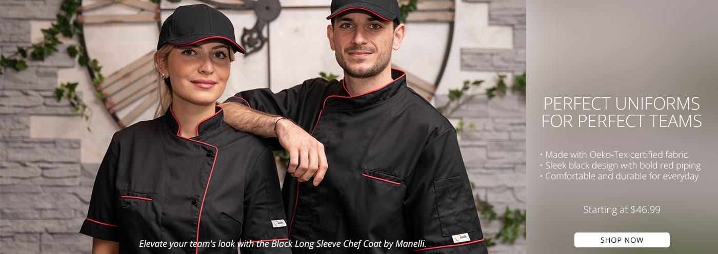 Two chefs wearing black and red chef coats by Manelli – professional kitchen uniforms